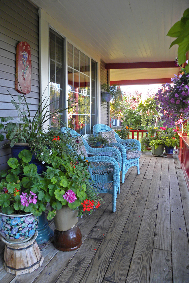 blue whicker furniture cottage flowers floor board decor Farmhouse-Porch