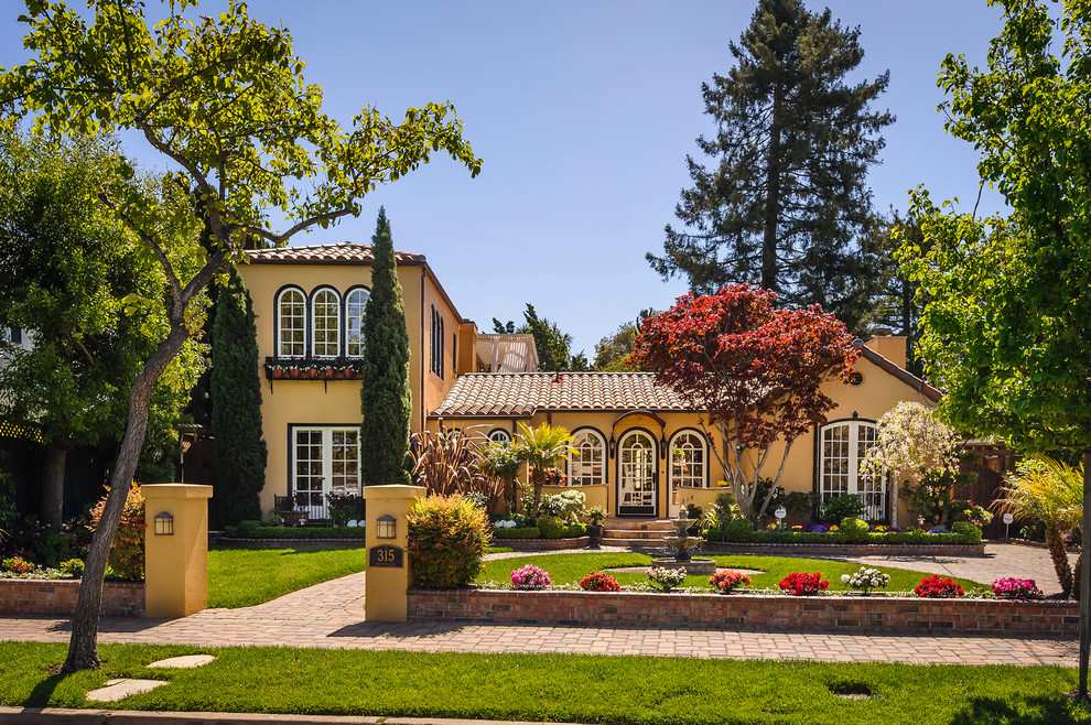 mediterranean-exterior curb appeal yellow walls