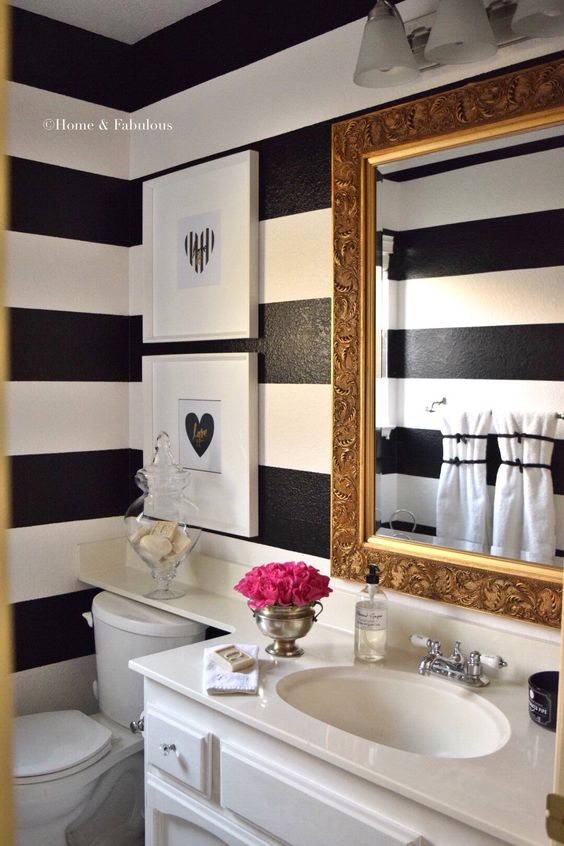 glam bathroom decorating black and white striped walls